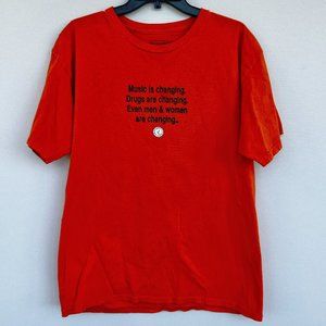 "PLEASURES"  orange shirt size large